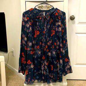 XS Free People women’s black tunic with tulle hem.